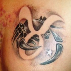 Татуировка на груди парня - знак зодиака Телец